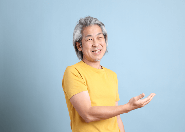 A Japanese man inviting gesture